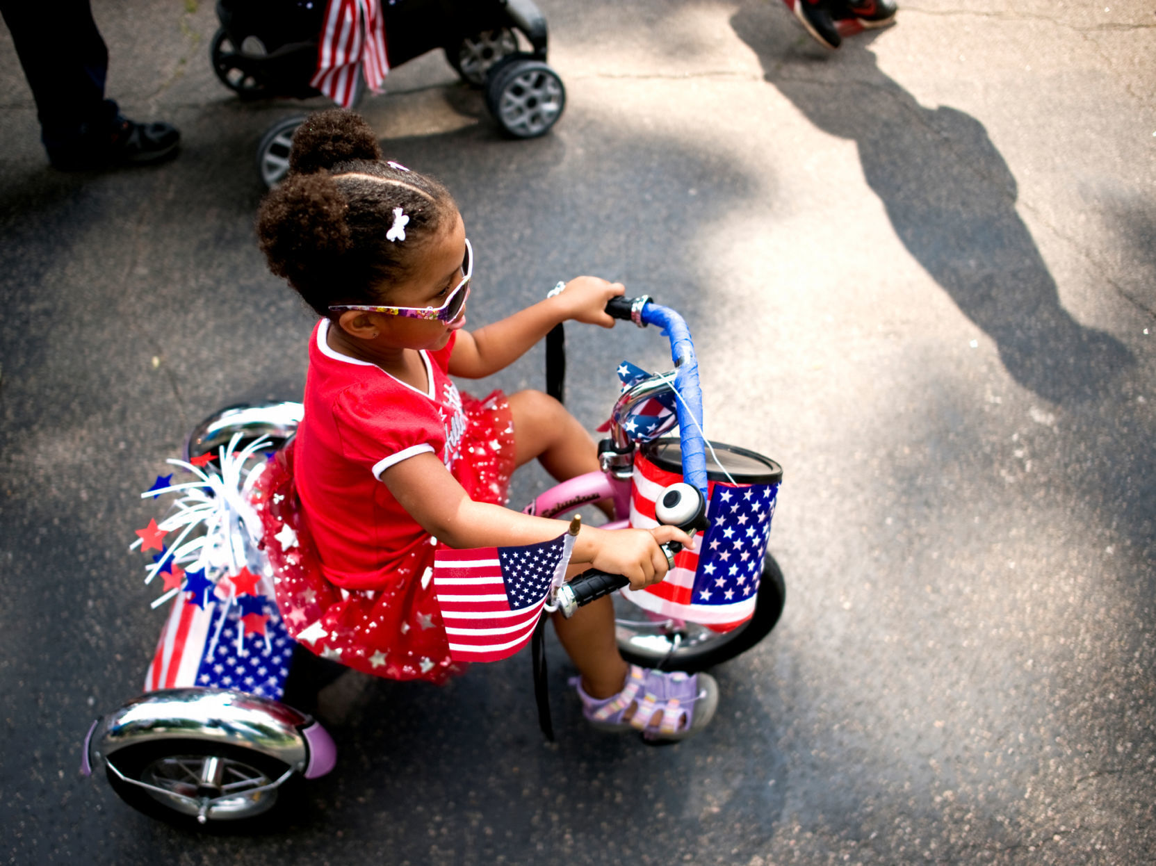 Tricycle girl at 2013 Independence Day